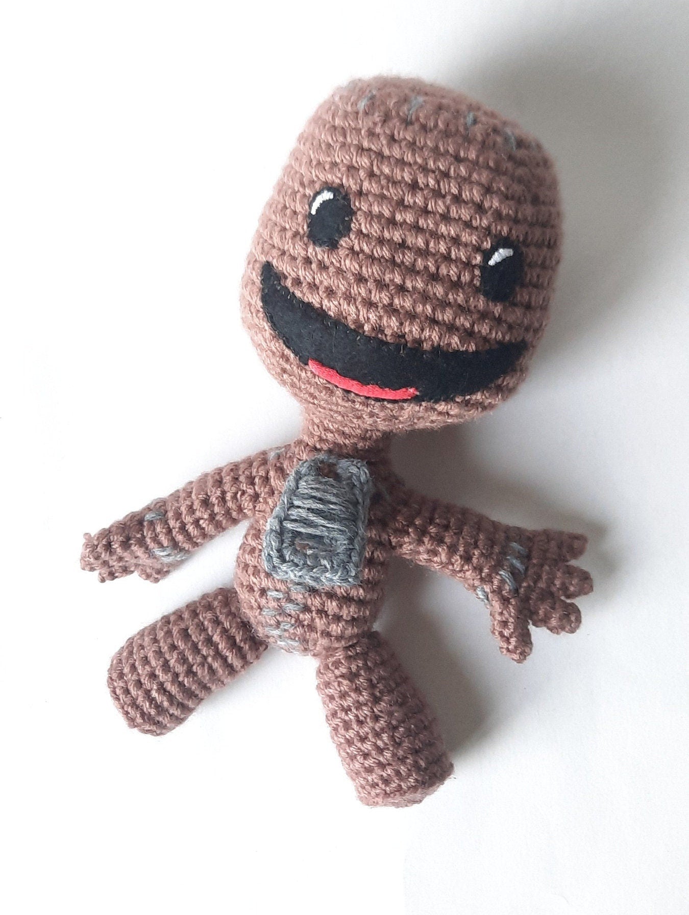 Sack Boy Amigurumi Crochet Pattern. How to Crochet Sock Boy video tutorials and stuffed toy Pattern. DIY Sock puppet crochet poppet pattern.