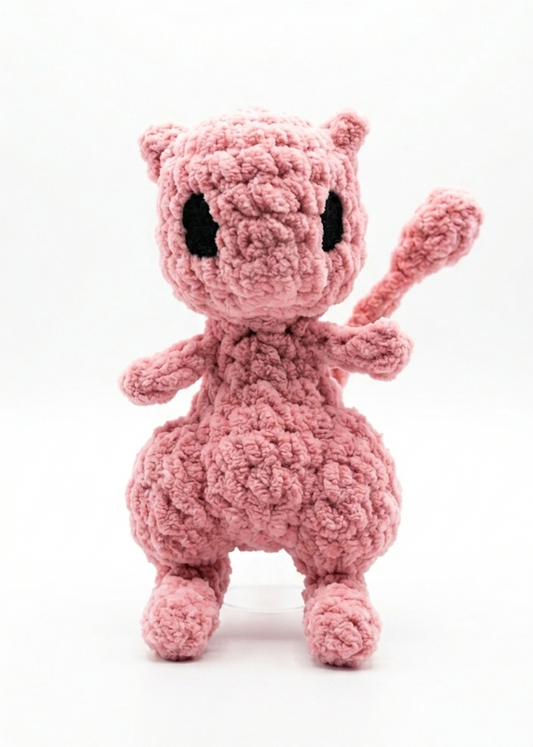 Pink plush mew toy on a white background