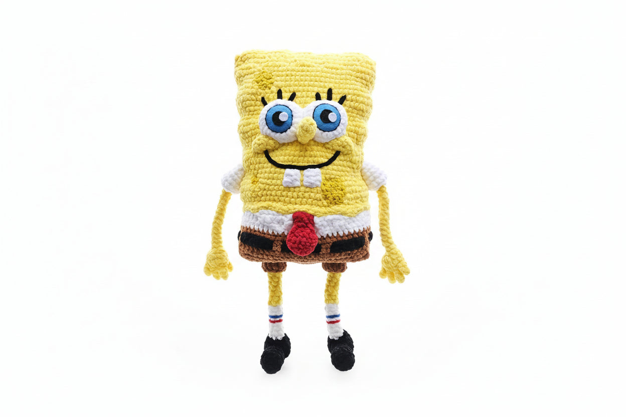 Crocheted SpongeBob SquarePants character on a white background
