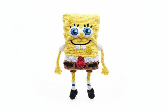 Crocheted SpongeBob SquarePants character on a white background